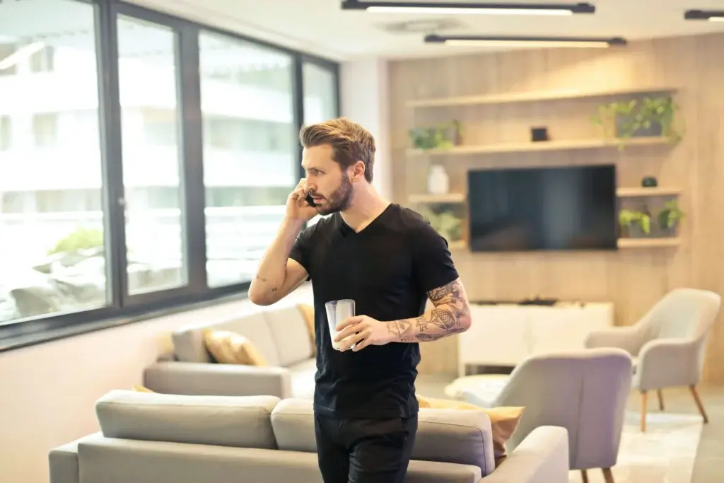 a man is getting a job rejection by a phone