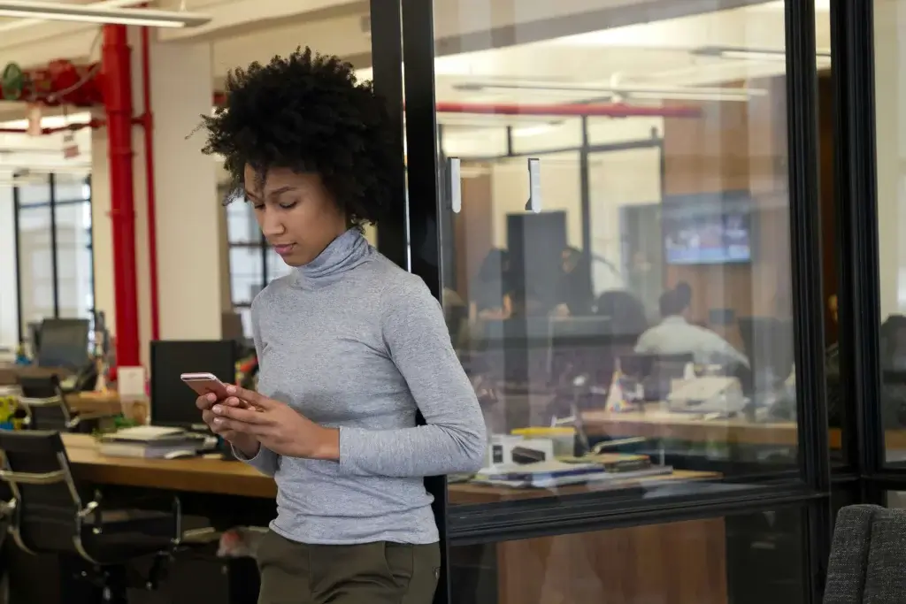 a woman is looking for an update from the hiring manager after the interview